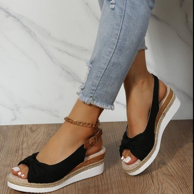 Women's peep-toe wedge slides