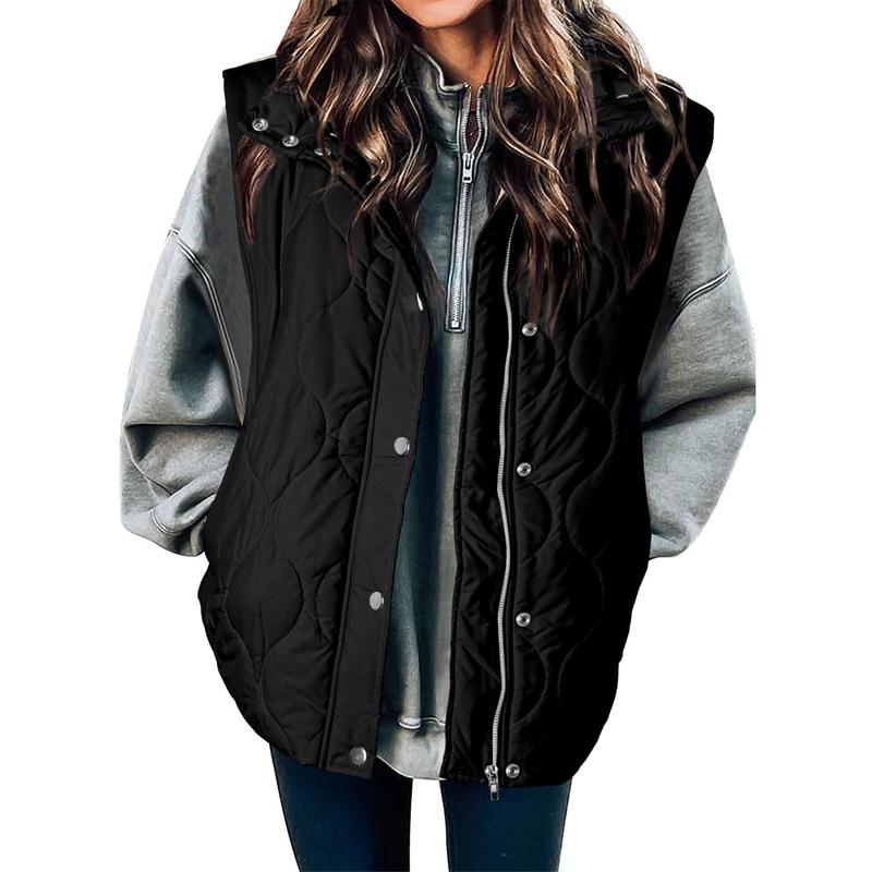 Black oversized puffer vest for women.