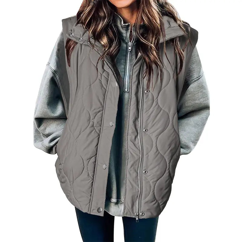 Gray oversized puffer vest for women.