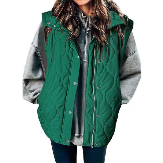 Green oversized puffer vest for women.