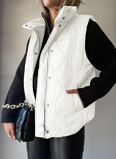 White oversized puffer vest for women.