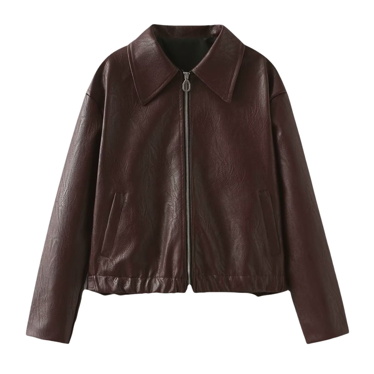 Woman wearing a cropped faux leather jacket