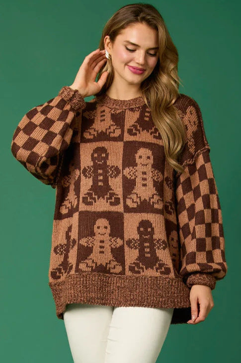 Woman wearing a gingerbread knit Christmas sweater