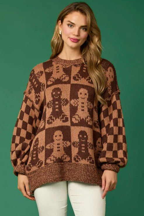 Woman wearing a gingerbread knit Christmas sweater
