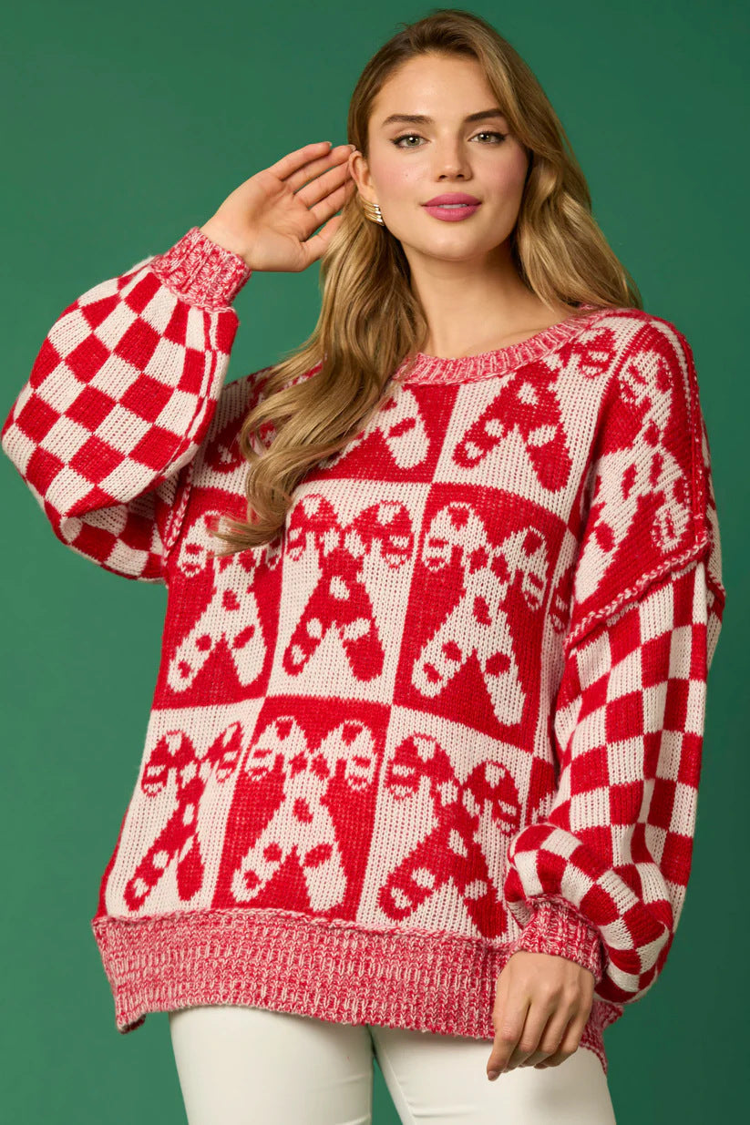 Woman wearing a gingerbread knit Christmas sweater