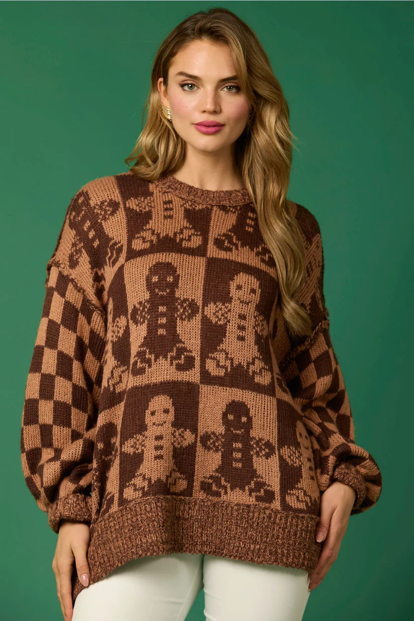 Woman wearing a gingerbread knit Christmas sweater