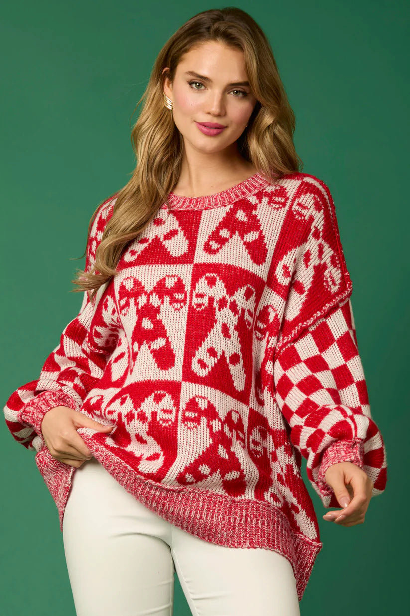 Woman wearing a gingerbread knit Christmas sweater