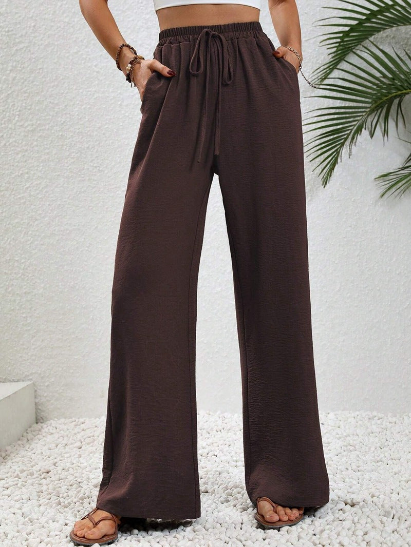Woman wearing casual wide leg drawstring pants