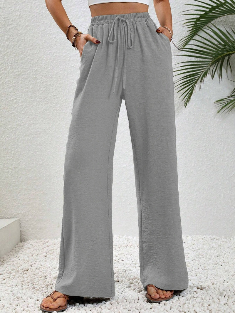 Woman wearing casual wide leg drawstring pants