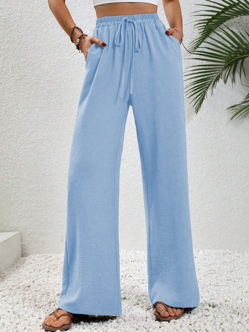 Woman wearing casual wide leg drawstring pants
