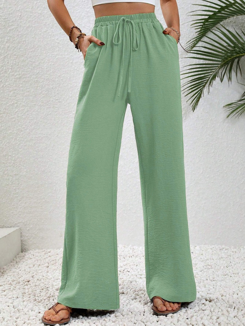 Woman wearing casual wide leg drawstring pants