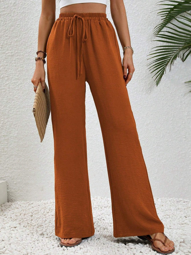 Woman wearing casual wide leg drawstring pants