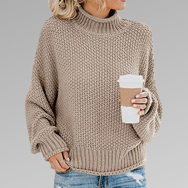 Woman wearing a chunky oversized turtleneck sweater
