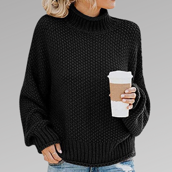 Woman wearing a chunky oversized turtleneck sweater