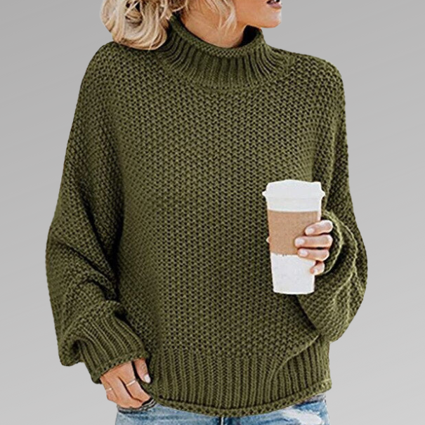 Woman wearing a chunky oversized turtleneck sweater