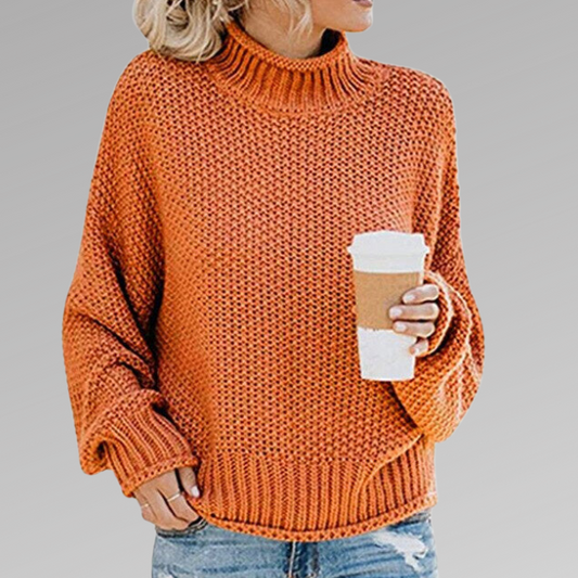 Woman wearing a chunky oversized turtleneck sweater