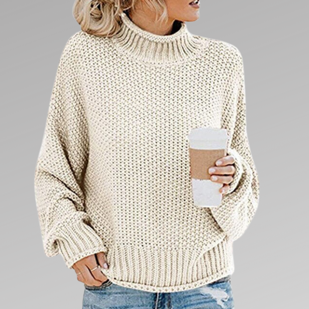 Woman wearing a chunky oversized turtleneck sweater