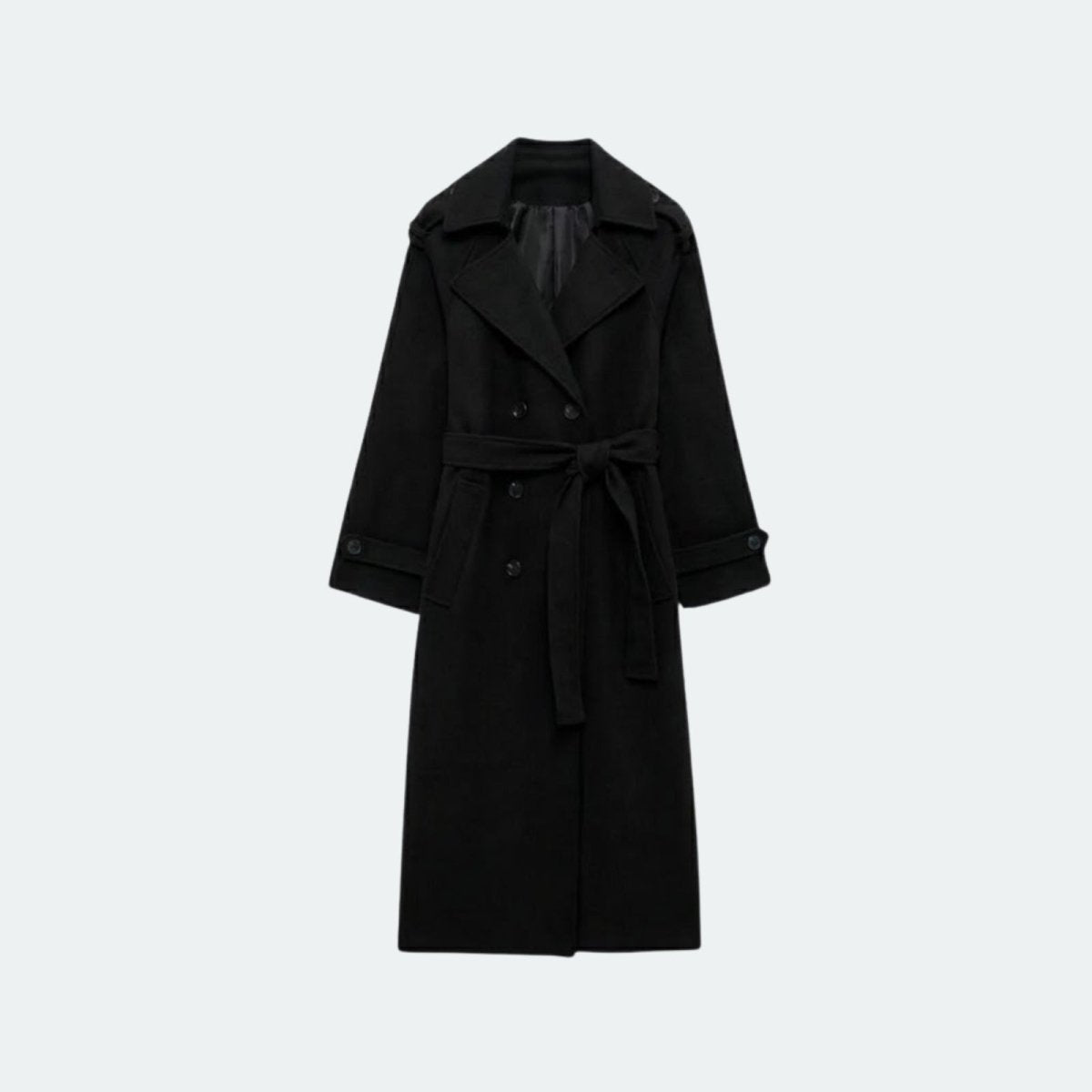 Woman wearing a long double-breasted belted trench coat