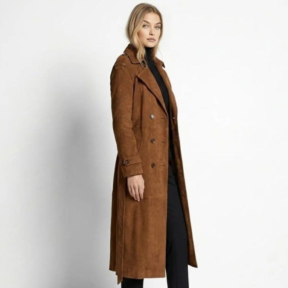 Woman wearing a long double-breasted belted trench coat