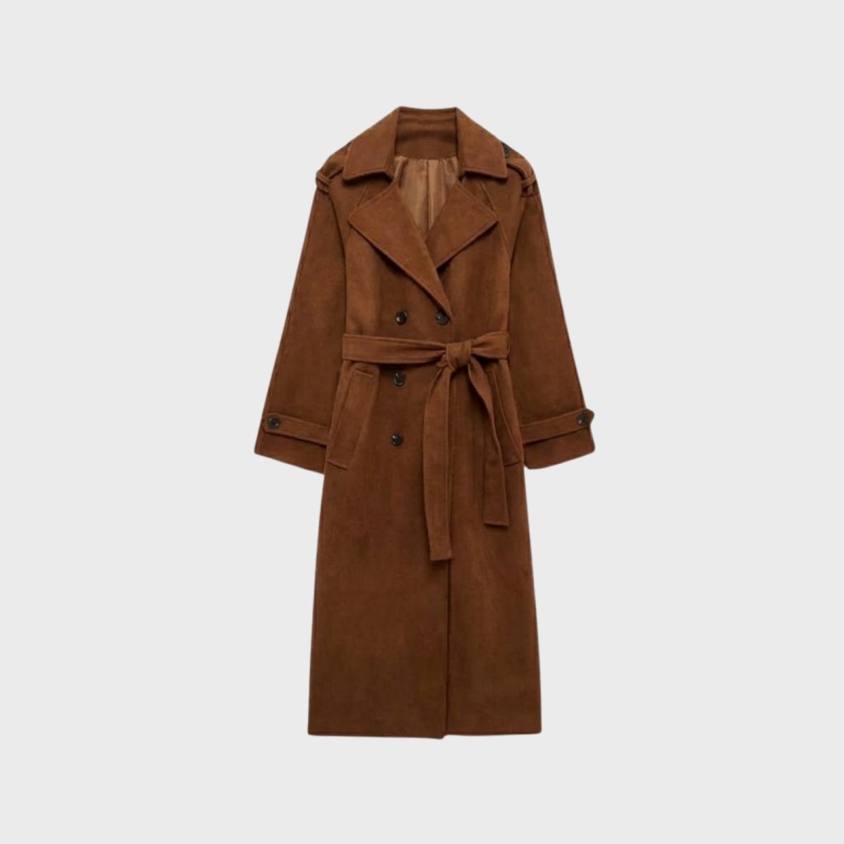 Woman wearing a long double-breasted belted trench coat