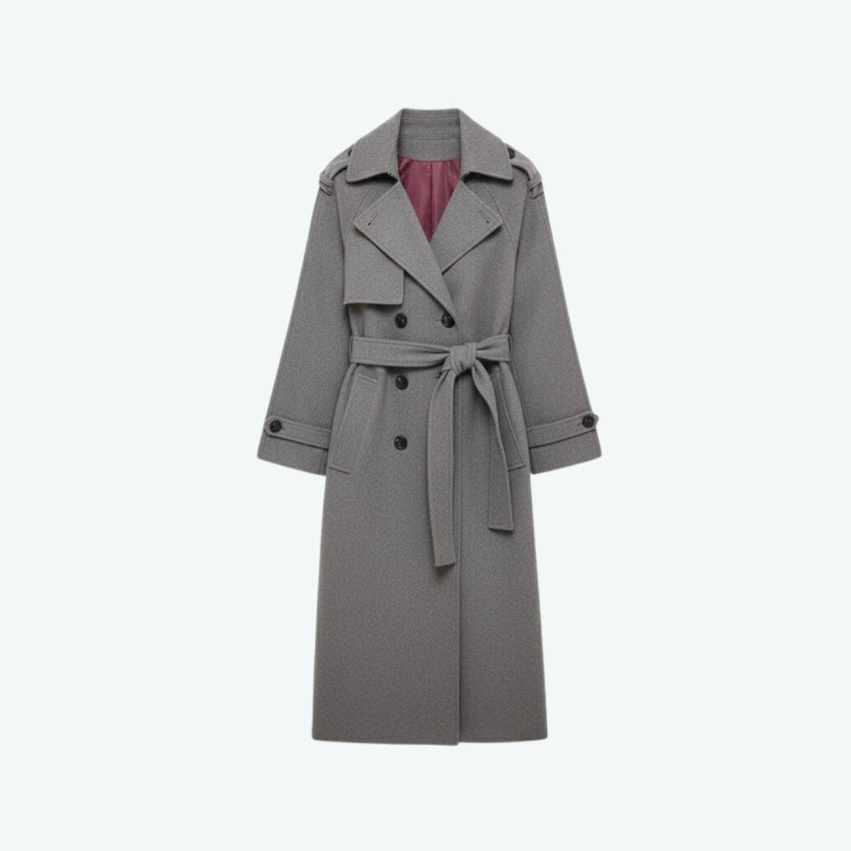 Woman wearing a long double-breasted belted trench coat
