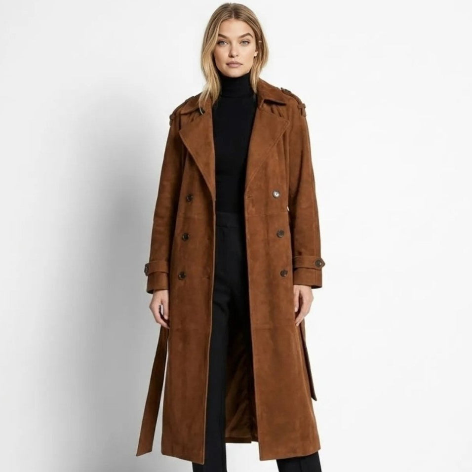 Woman wearing a long double-breasted belted trench coat