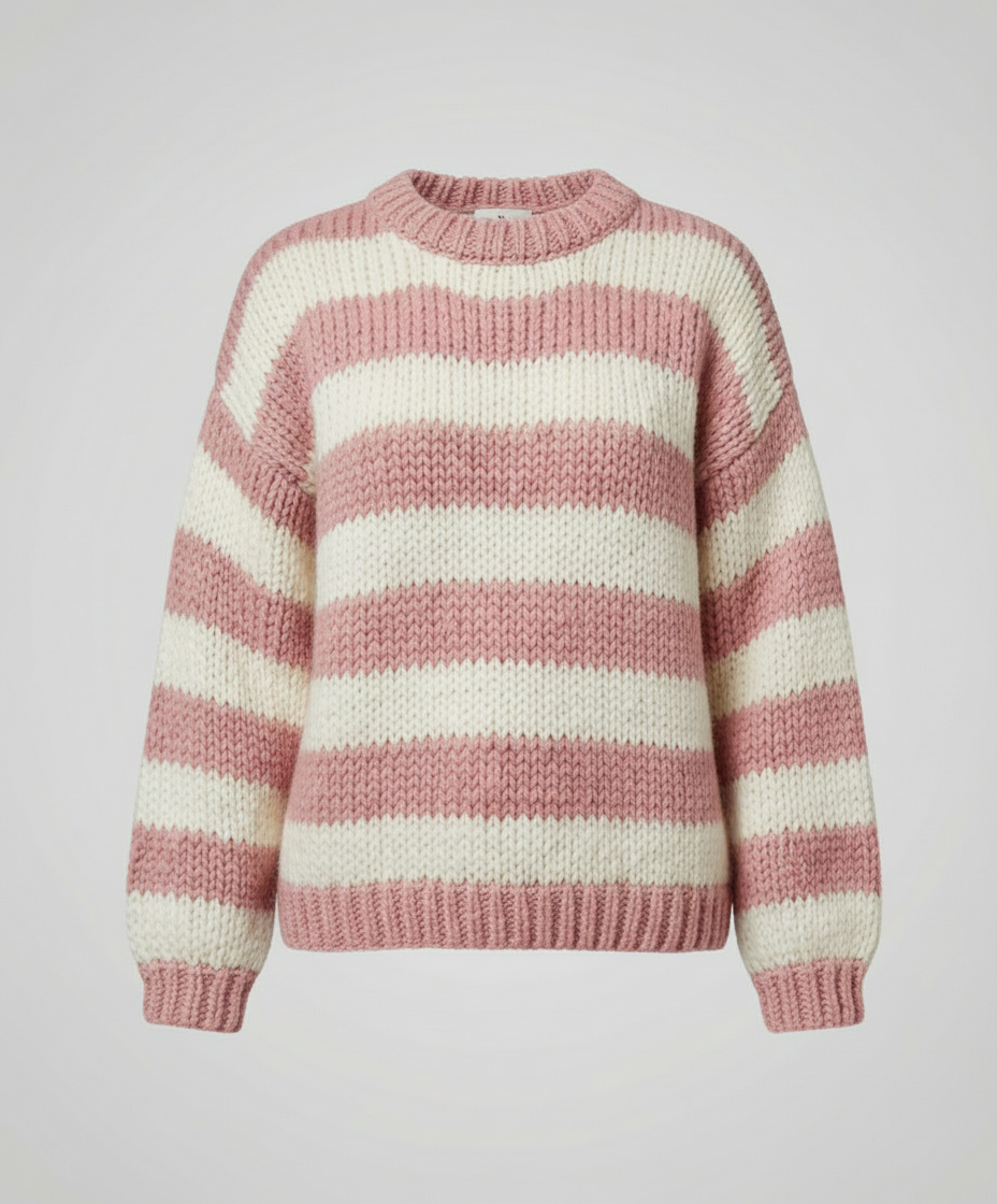 Woman wearing a striped oversized knit sweater