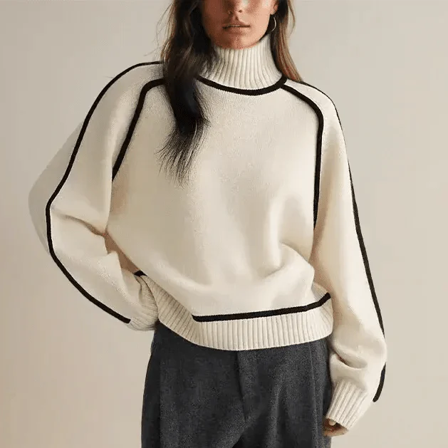 Woman wearing a contrast oversized turtleneck sweater