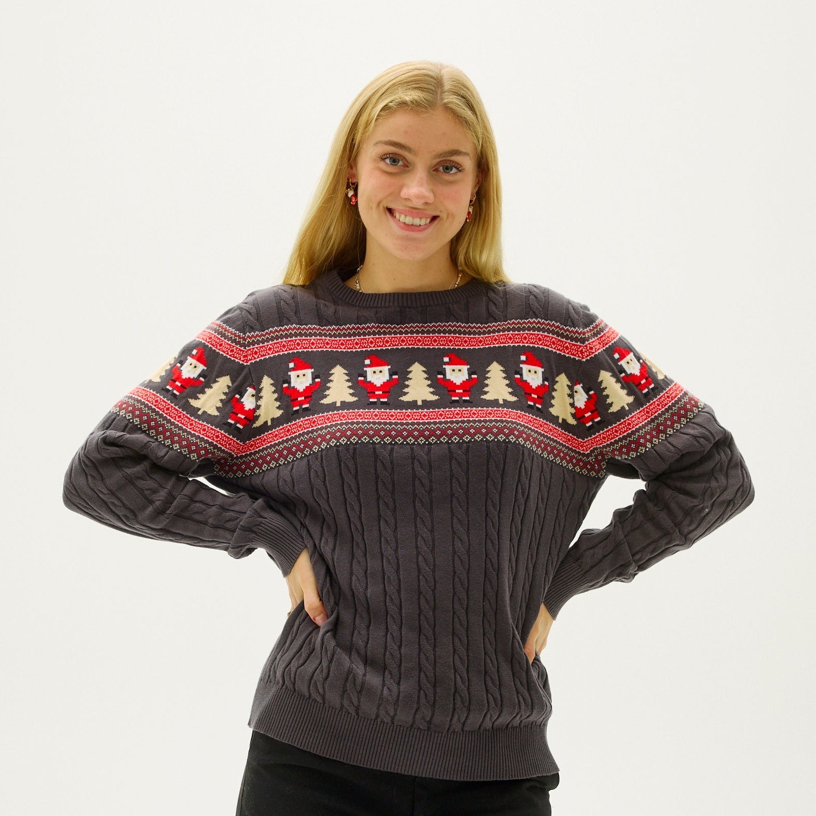 Woman wearing a cozy snowflake knit Christmas sweater