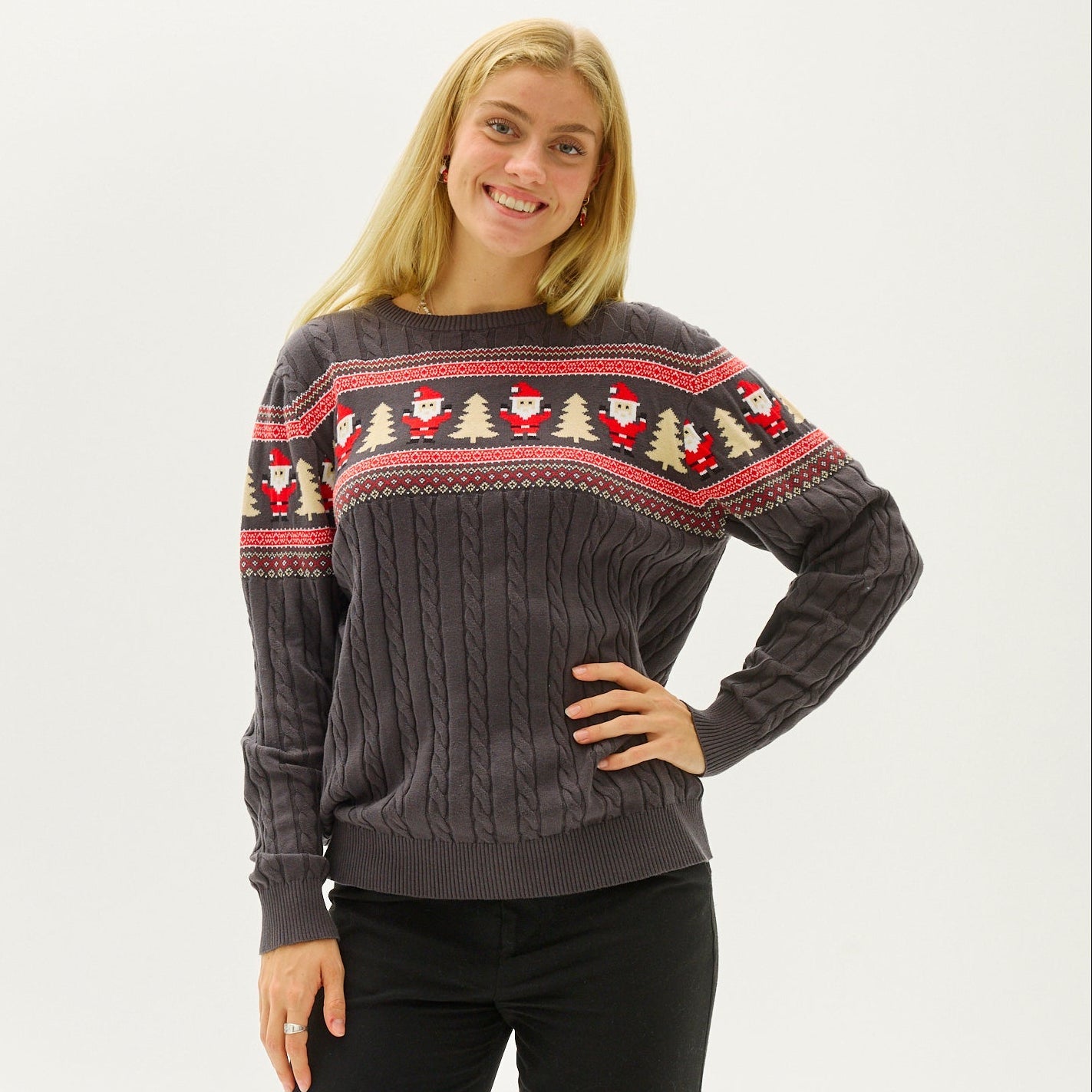 Woman wearing a cozy snowflake knit Christmas sweater