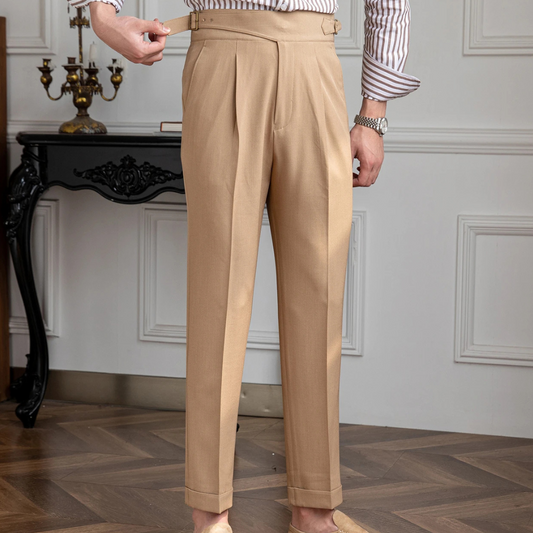 Man wearing tapered pleated dress pants