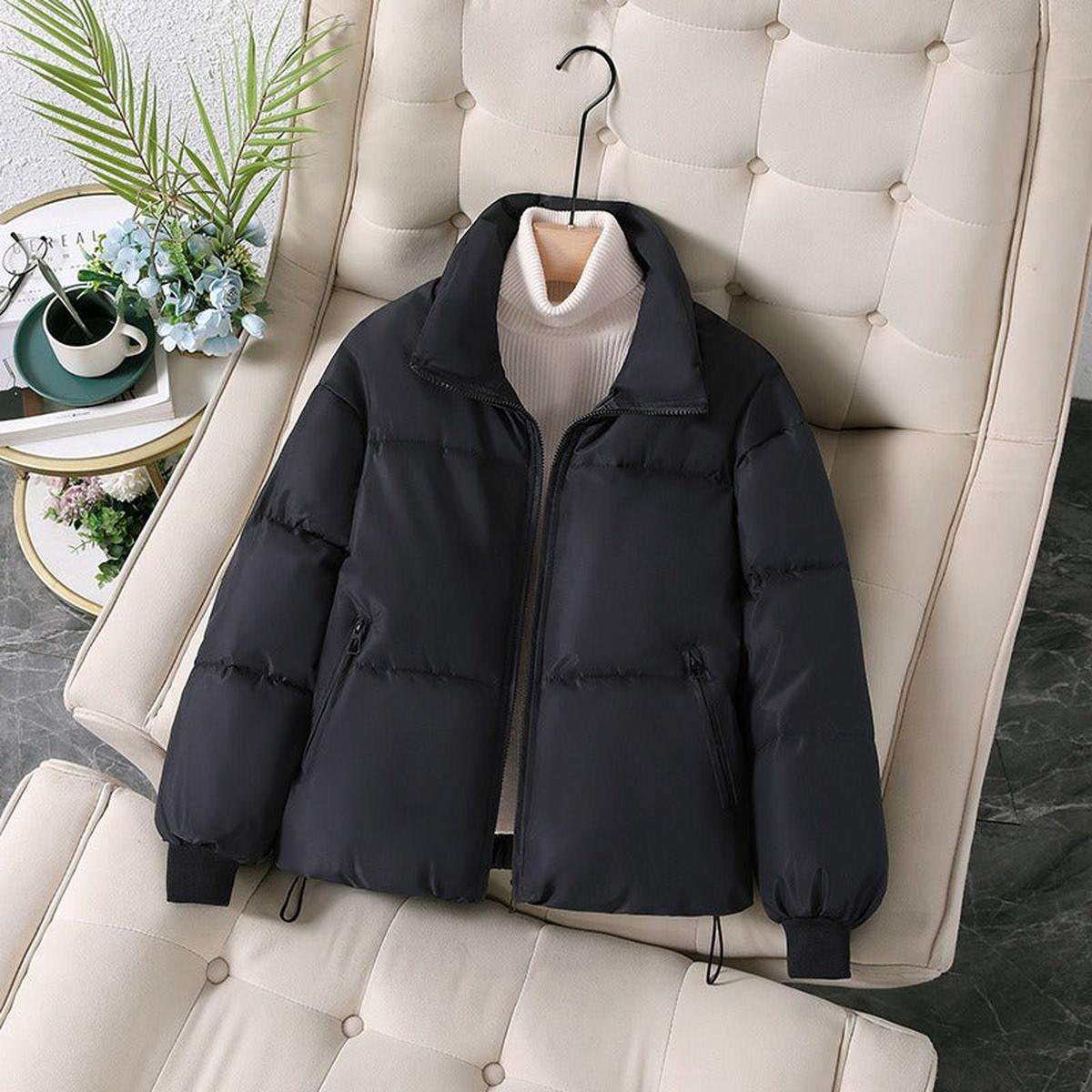 Woman wearing an oversized quilted puffer jacket