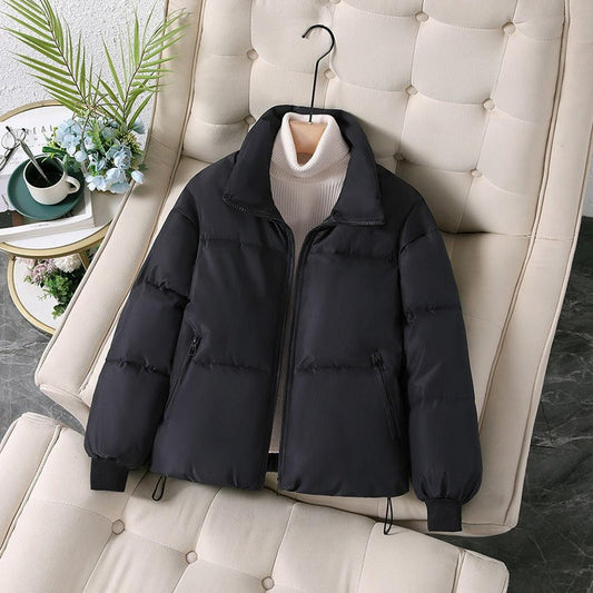 Woman wearing an oversized quilted puffer jacket