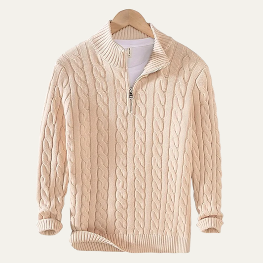 Man wearing a cable knit half zip sweater