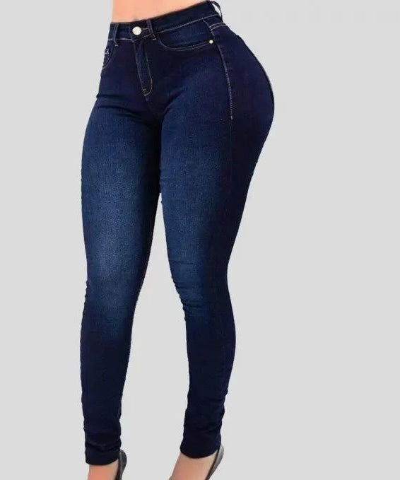 Woman wearing high rise stretch skinny jeans